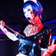 Illustration for article titled Controversial Game Brought to Life With Tight Rubber, a Nice Lady and Fake Blood